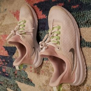 Nike 3.5Y pink and white slightly worn. Still in good shape